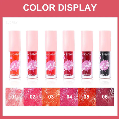 Color display of Fruit Juice long-lasting lip and cheek stains in six vibrant red, pink, and orange moisturizing shades.